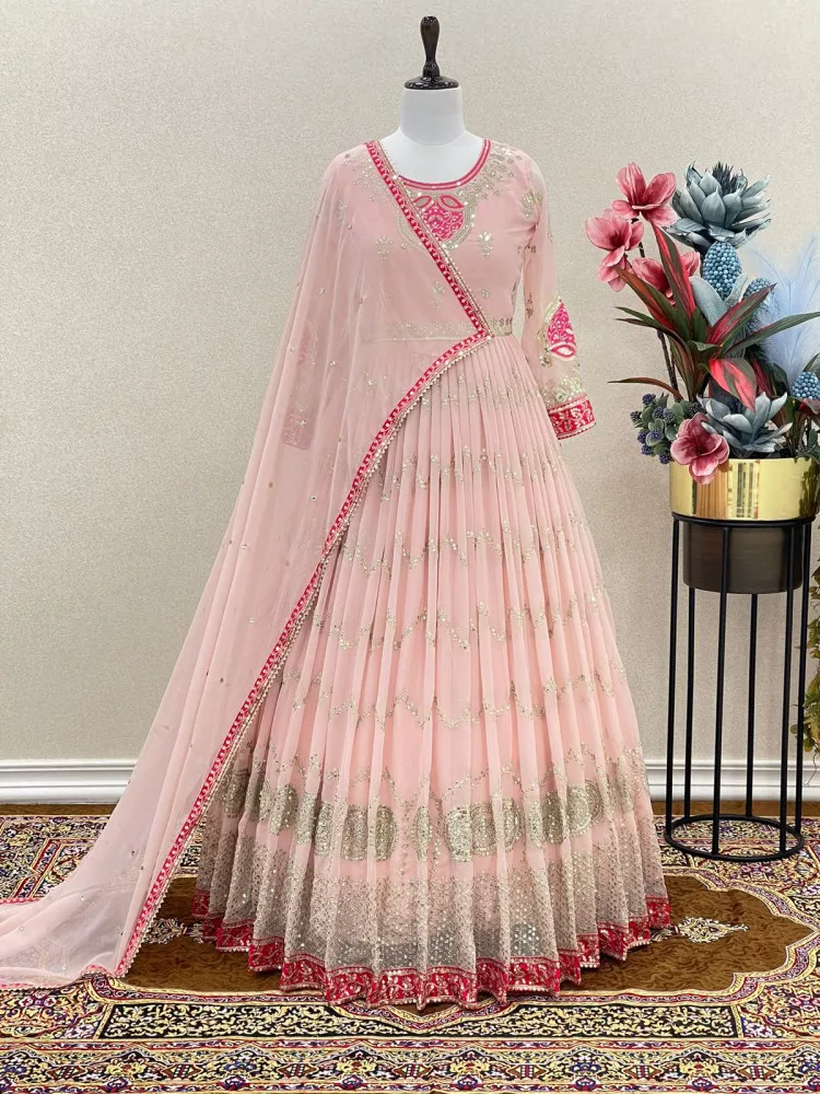 New designer best-embroidered gown light pink color with a price.