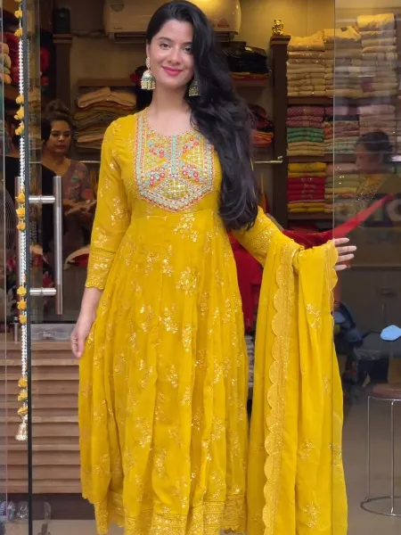 Glowing Light Yellow Colored Partywear Tapetta Gown
