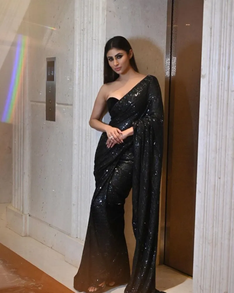 Mouni Roy Looks Ravishing In A Red Ruffle Saree by Sanya Gulati Worth Rs 30K