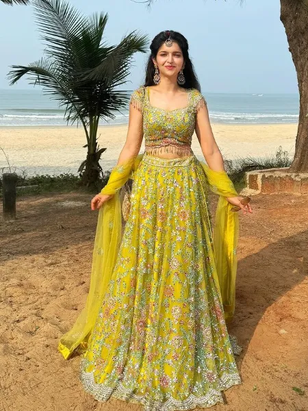 Yellow Bridal Lehenga Choli in Soft Net With Heavy Embroidery and Real Mirror